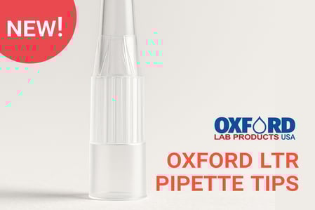 Clear pipette tip standing upright with text reading "NEW!" in a red circle, and "OXFORD LAB PRODUCTS USA – OXFORD LTR PIPETTE TIPS" in bold red and blue font. The image promotes Oxford Lab Products' new LTR pipette tips, suggesting high precision and innovation.