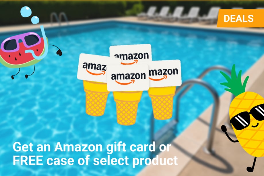 A bright, fun summer-themed promotional image featuring an outdoor swimming pool with lounge chairs in the background. In the foreground, animated characters of a pineapple and a watermelon with sunglasses and smiling faces flank a stack of Amazon gift cards popping out of yellow ice cream cones. An orange 
